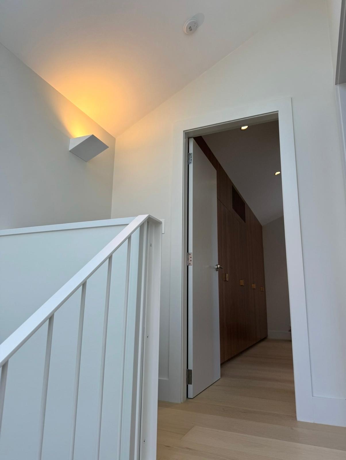 Upper landing with timber joinery beyond